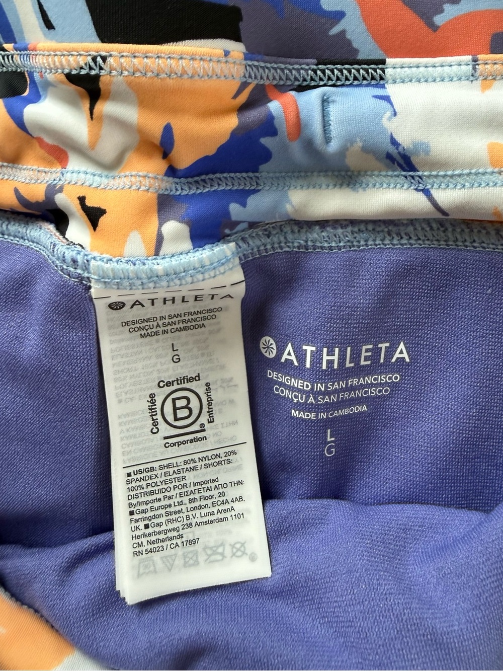 Athleta Floral Swim Shorts Women’s Large Blue Peach Board Shorts - Picture 3 of 3